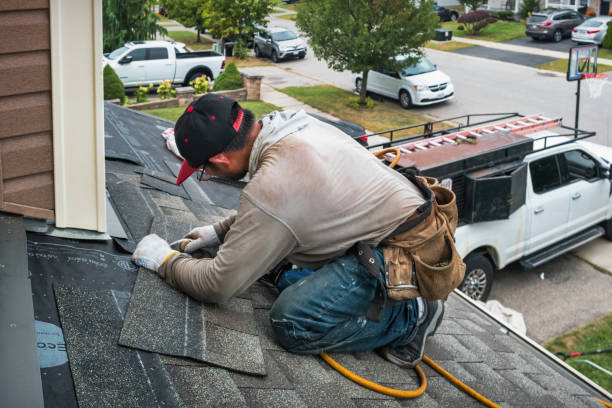 Professional Roofing technician working in Rehoboth, MA